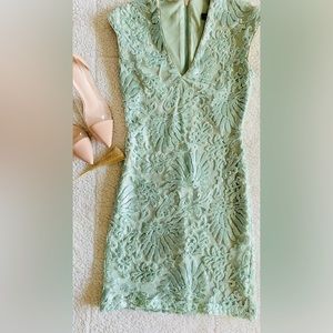 Green/mint mini formal dress with details of sequins